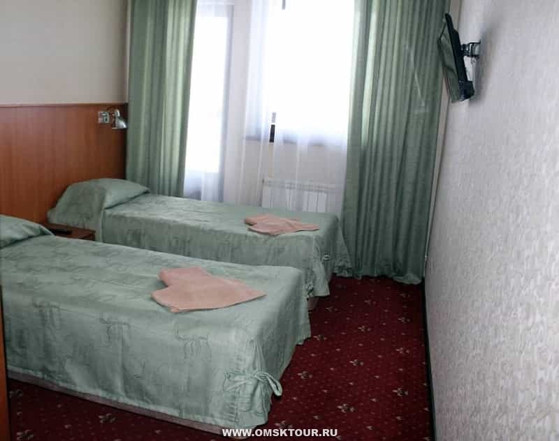 Спальня в номере люкс плюс в гостинице 